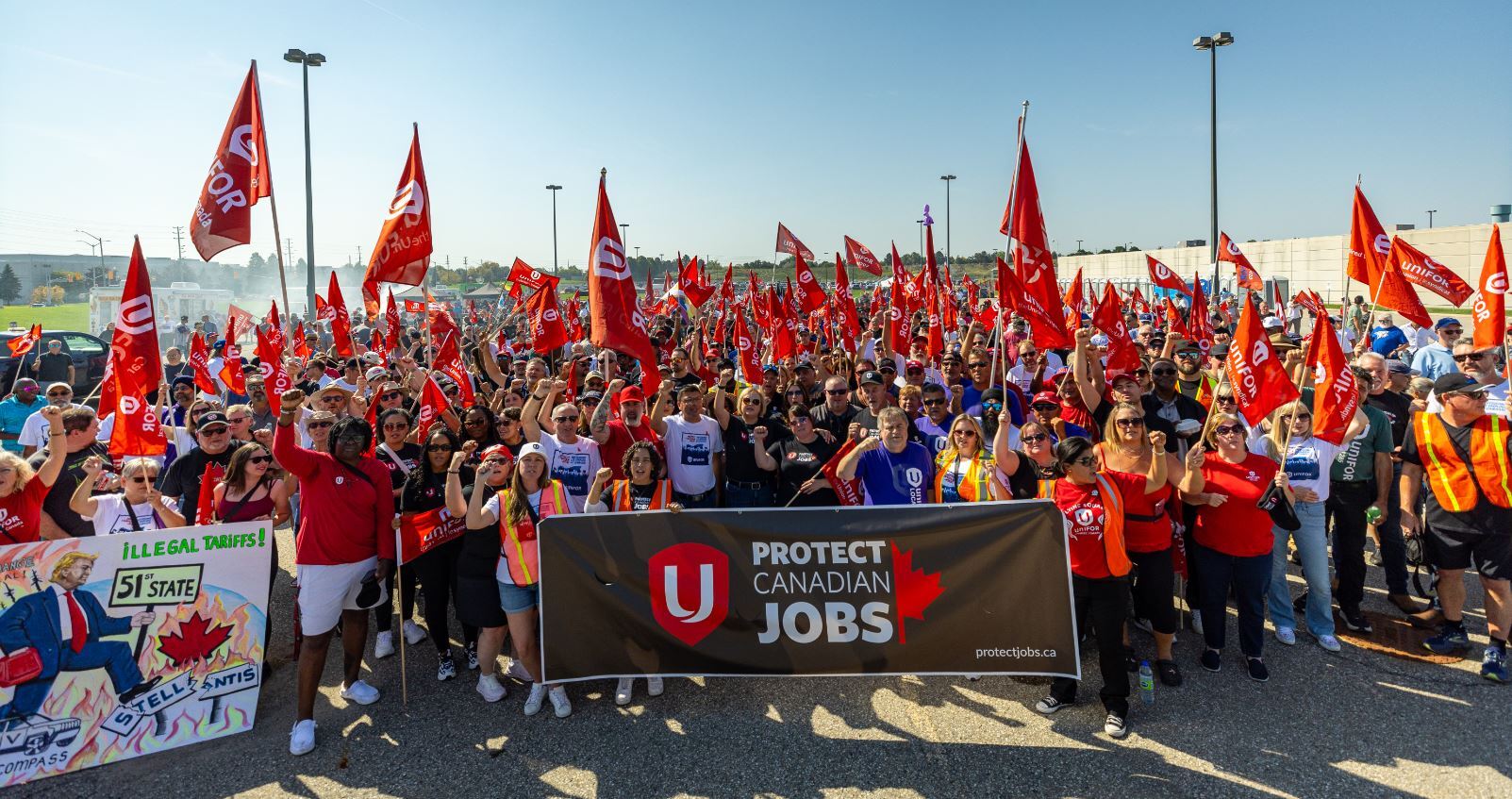 Unifor union members rally with 'Protect Canadian Jobs' banner at protectjobs.ca campaign event