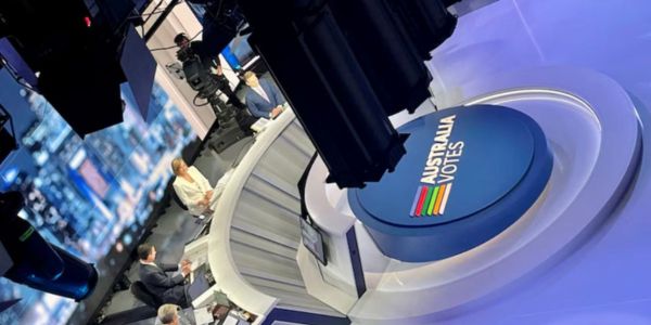 Reporter in a news room