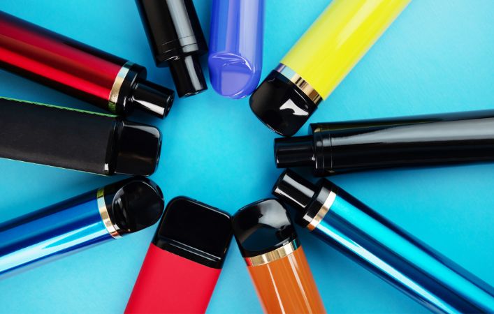 Circle of colorful vape pens