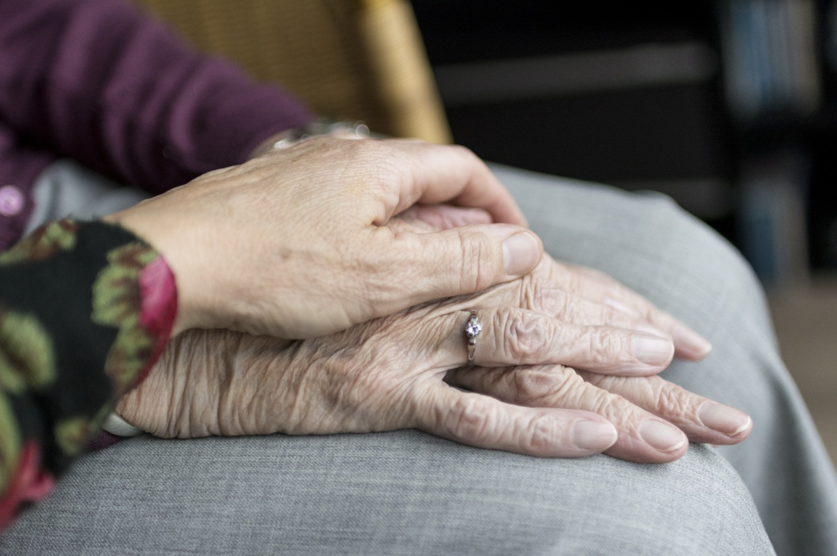 Two hands touching