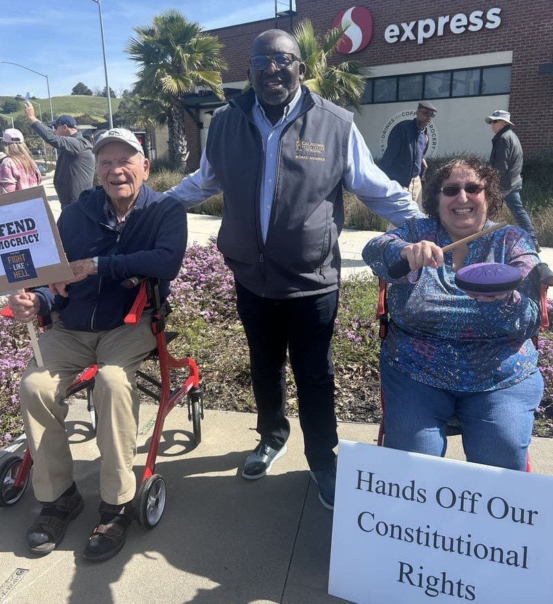 Ahmad joining demonstrators on a street corner