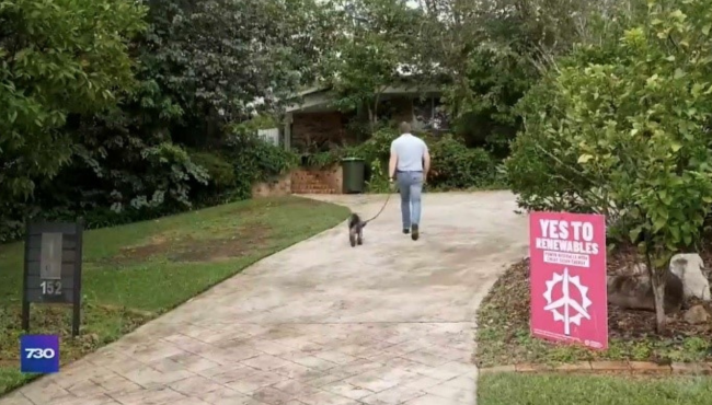 Screenshot of ABC footage featuring an ACF yard sign