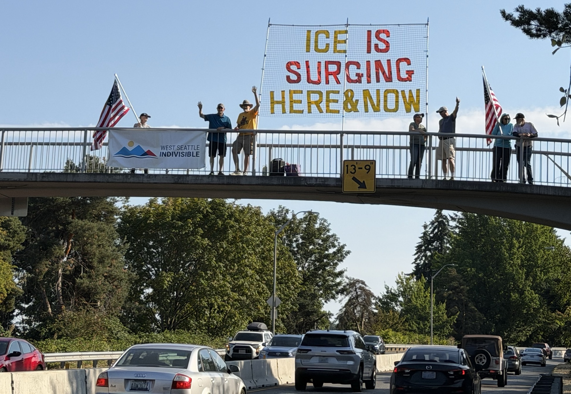 Kirkland WA Bannering for Canada & Against ICE