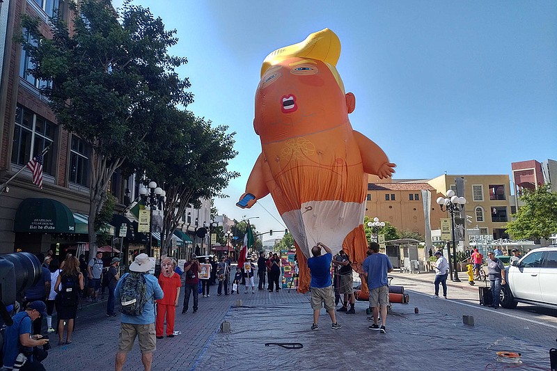 Baby Trump Balloon Greets President in San Diego