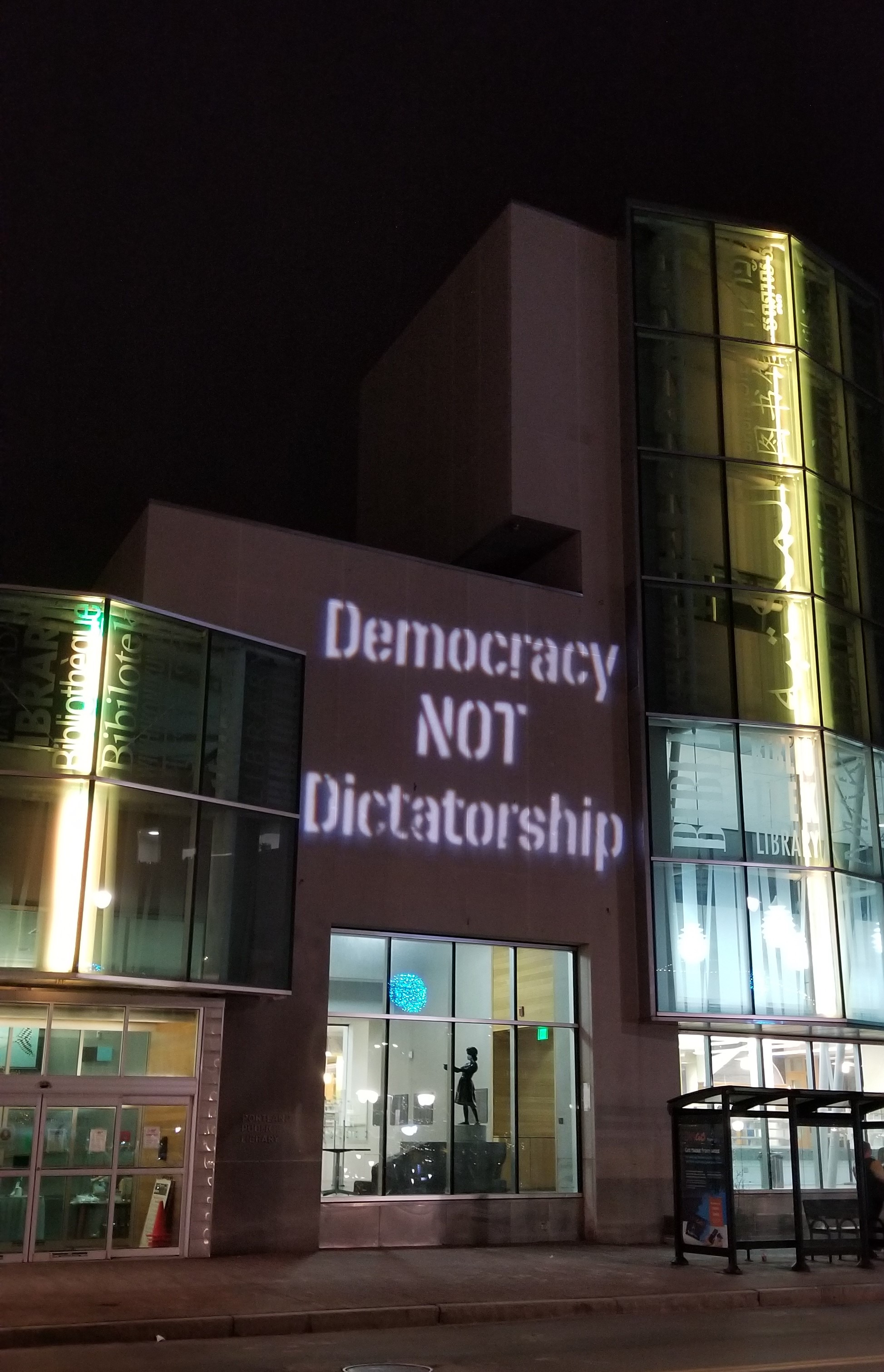 Light projections urge lawmakers to take action against Trump 