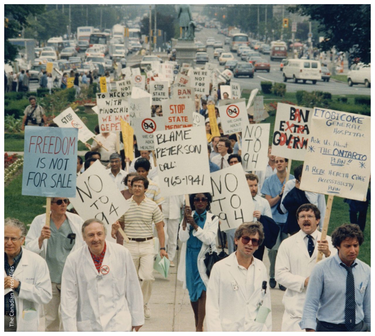 Ontario physicians march on Queen’s Park in Toronto, Ont., June 15, 1986, during their strike to protest a government ban on extra-billing. Image courtesy of The Canadian Press/files Ontario physicians march on Queen’s Park in Toronto, Ont., June 15, 1986, during their strike to protest a government ban on extra-billing. Image courtesy of The Canadian Press/files