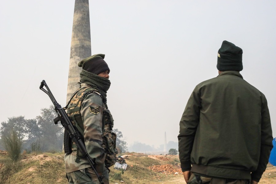 A security contingent outside the offices of BGR mining which some protesters had vandalised on 4 October 2024, an incident which led to firing in the air. Image by the author