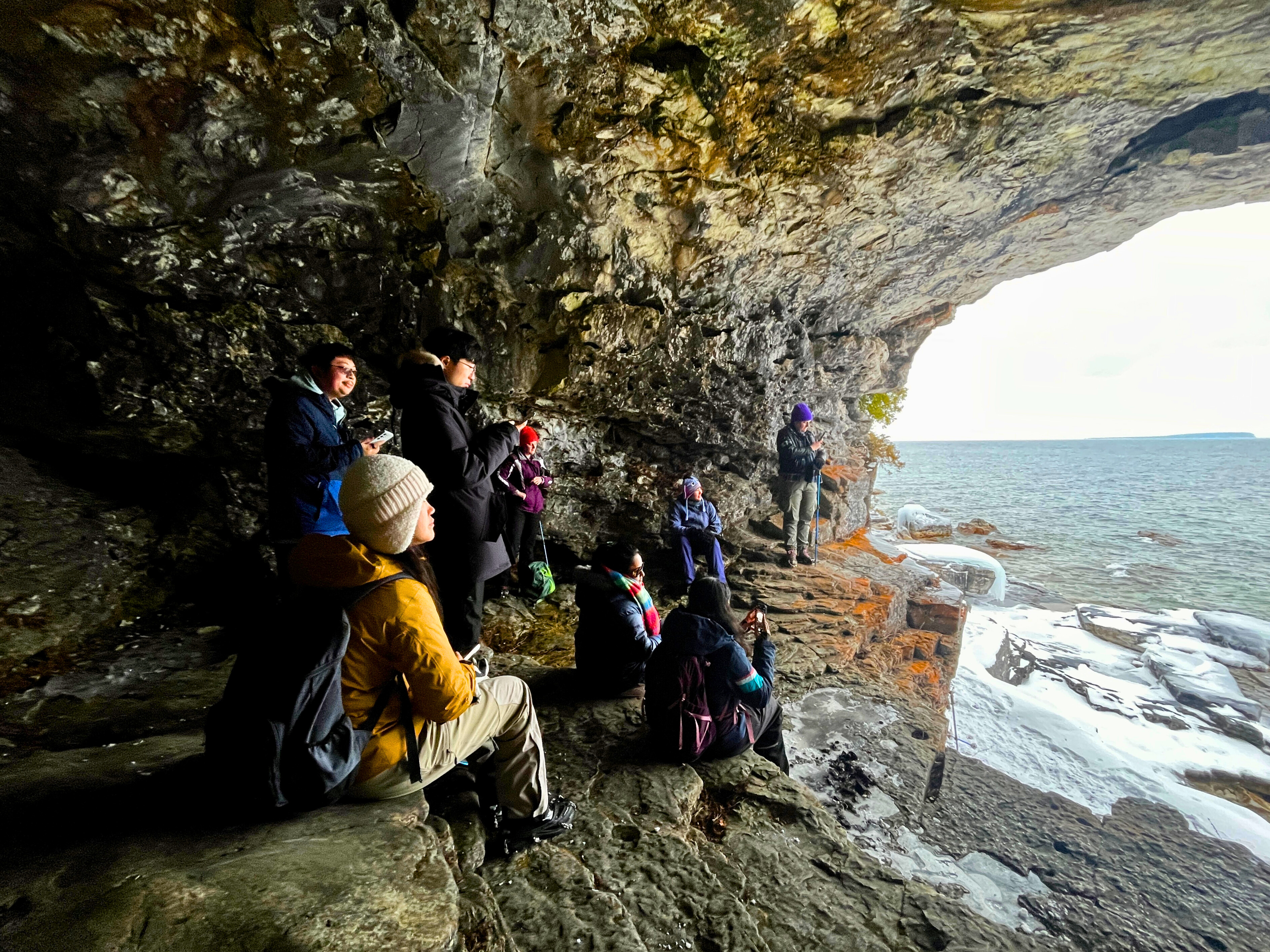 Exploring a cave at Bruce Peninsula National Park on a tour with an EcoAdventures Guide Exploring a cave at Bruce Peninsula National Park on a tour with an EcoAdventures Guide