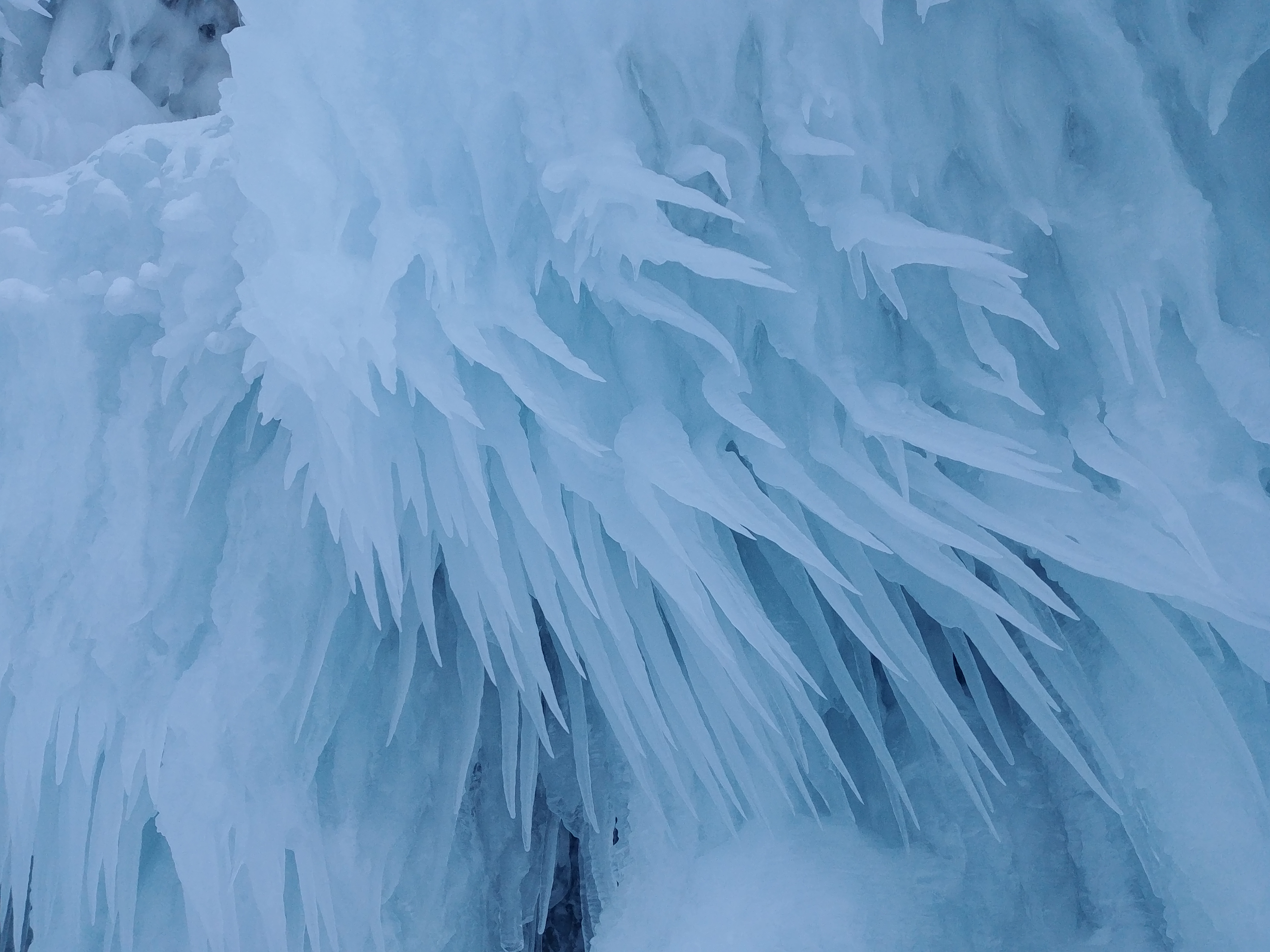 Natural Ice Sculptures Along the Grotto Shoreline