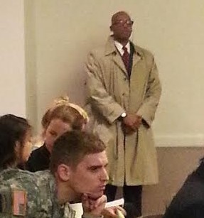 Kymone Freeman of We Act Radio played a security guard from Academi, formerly Xe and before that Blackwater, for General Colin Powell who the audience was told was coming to the conference as he had just been appointed to head Obamas Energy Security Task Force.