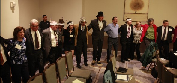 Homeland Security and corporate contractors participate in circle dance to celebrate new energy plan