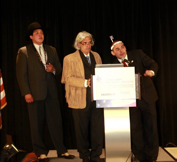 Gitz Crazyboy , Andy Bichlbaum and Mike Bonnanno ( of the Yes Men playing a representative of a public relations firm for General Colin Powell who the audience was told chaired a task force on the new energy program) take questions from the audience