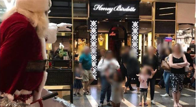 Honey Birdette windows blacked out for Santa parade