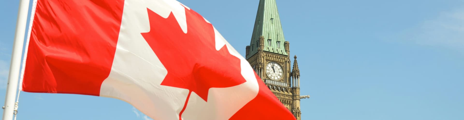 Canadian flag in front of Parliament