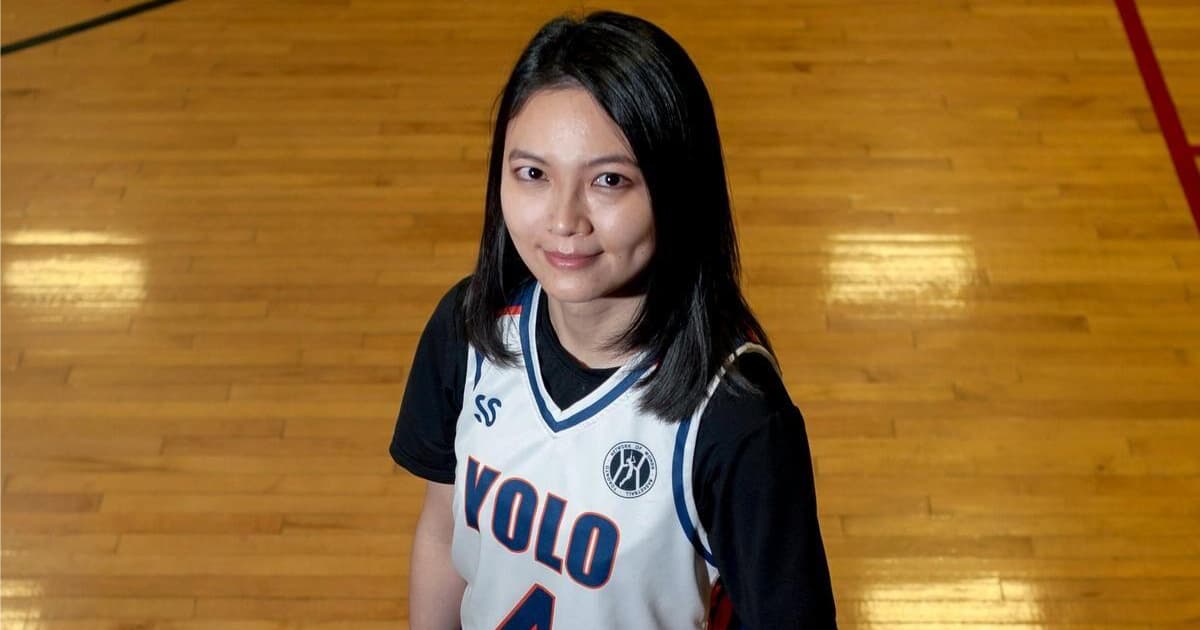 Caren Cao goes for a slam dunk with Network Of Women in Basketball
