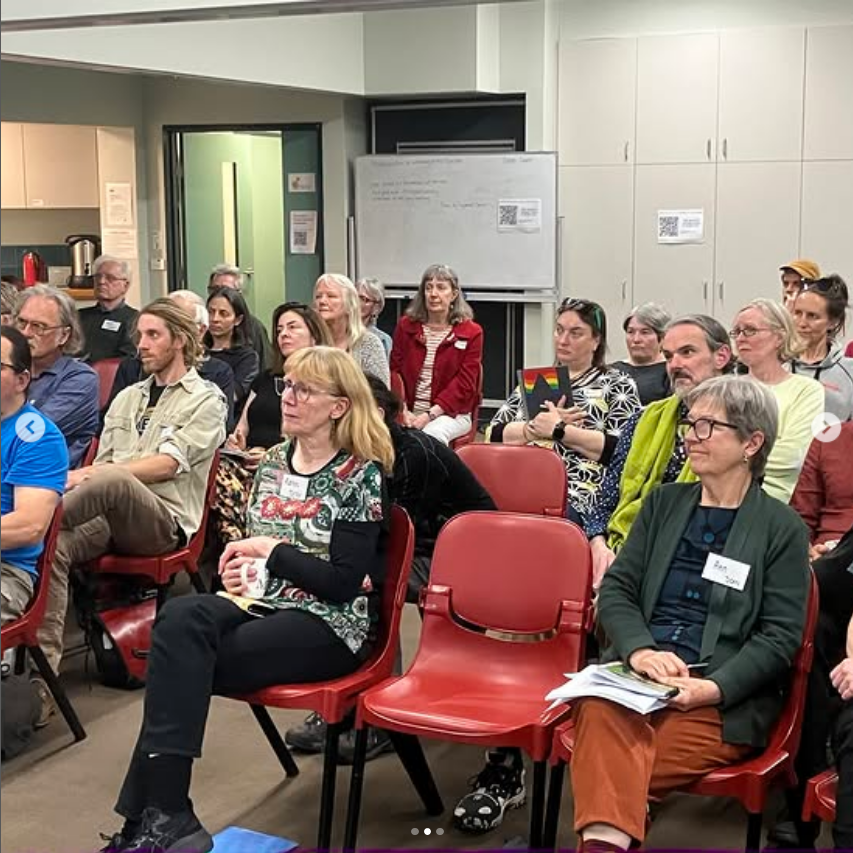 Audience listening to David Spratt's message