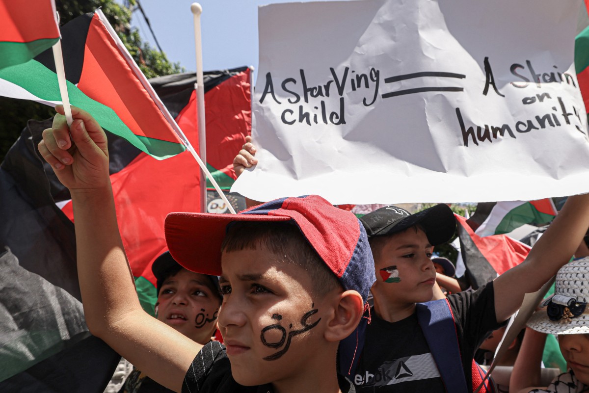 Palestinian children during a demonstration in support of Palestinians in Gaza facing severe shortages of food and other essentials in Nablus in the occupied West Bank on July 22, 2025.  (Photo: Jaafar Ashtiyeh / AFP)