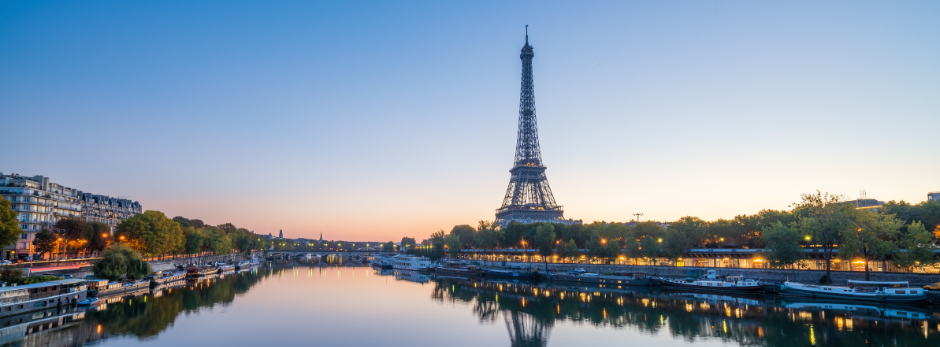 Eiffel Tower in the evening with a river view