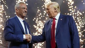 RFK Jr. shakes hands with President Trump at a rally in AZ