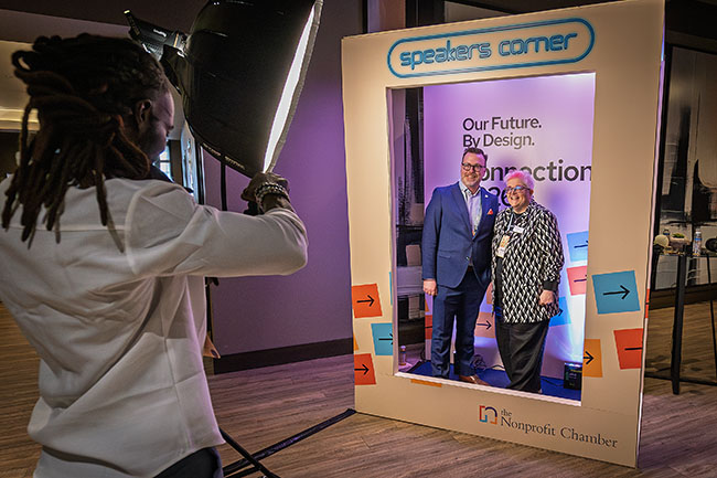 Img Alt:Cllr. DJ Kelly has his photo taken with Nonprofit Chamber CEO Angie Gélinas at the Chamber's 2026 Connections Conference at Hudson on April 23, 2026. (Aryn Toombs / Ward 4)