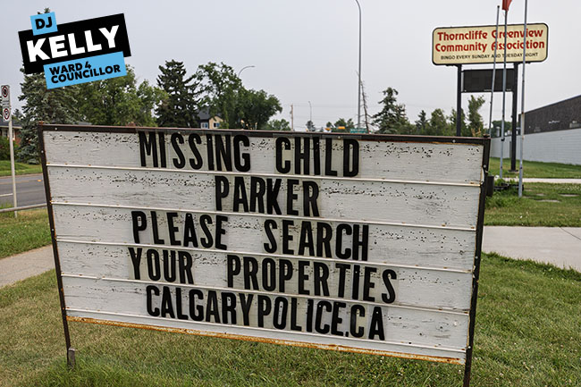 Img Alt: The Thorncliffe-Greenview Community Association's sign asking people travelling along Centre Street N to search their properties for the missing child Parker. (Aryn Toombs / Ward 4)