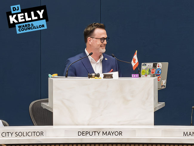 Img Alt: Cllr. DJ Kelly chairs the Public Meeting of Council on July 24, 2026. (Aryn Toombs / Ward 4)