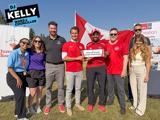 Img Alt: Cllr. Kelly joins Secretary of State (Sport) Adam van Koeverden and Canadian Tire Jumpstart Charities in announcing Calgary will be receiving a new soccer mini-pitch, at a Beddington Heights press conference on July 28, 2026. (Aryn Toombs / Ward 4) 