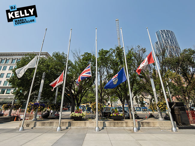 Img Alt: The City of Calgary flies flags at half-mast at City Hall in remembrance of Parker. (Aryn Toombs / Ward 4)