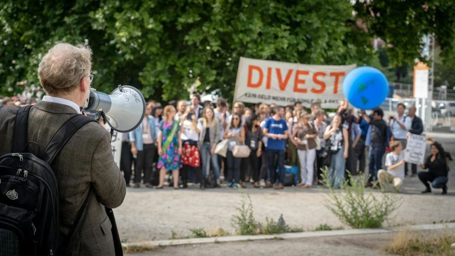 group of protesters at a divest rally