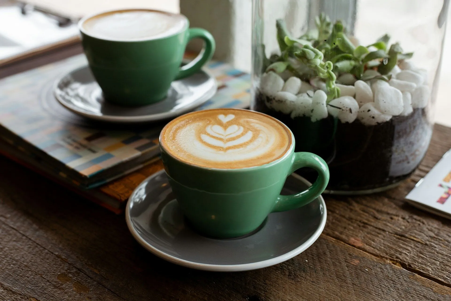 Image of a latte on a wood table