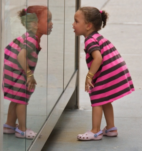 Self-Awareness Girl looking at reflection of herself in mirrored folding closet door. Image from GroupWorksDeck.org for pattern: Self-Awareness Creator: Ed Yourdon Permission Status: cc by-sa 2.0 Permission Notes: http://www.flickr.com/photos/yourdon/3852275732
