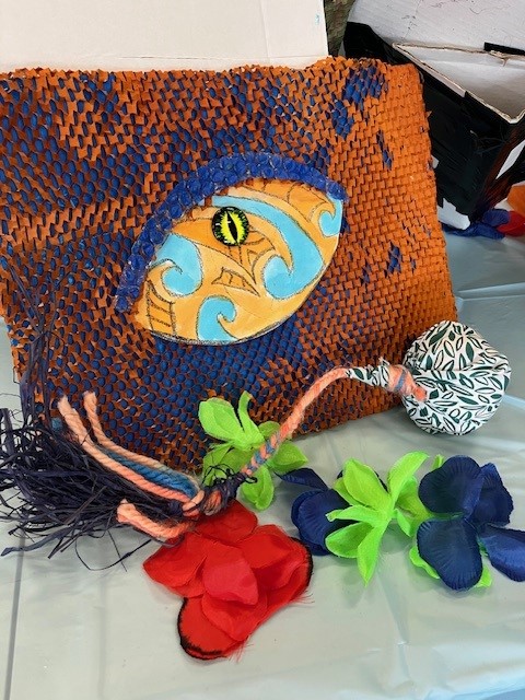 Weave display with flowers and poi - Pakuranga art 6