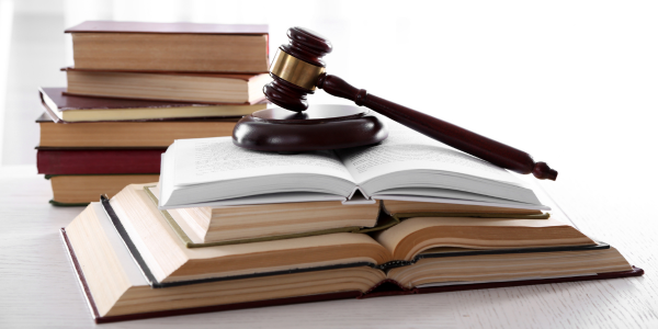 gavel on top of books
