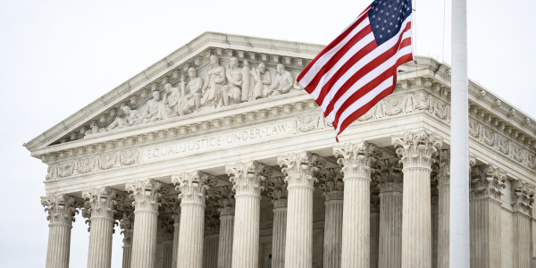 supreme court house with flag