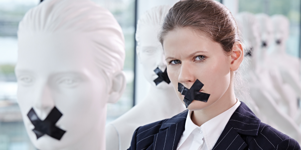 speak out woman with tape over her mouth