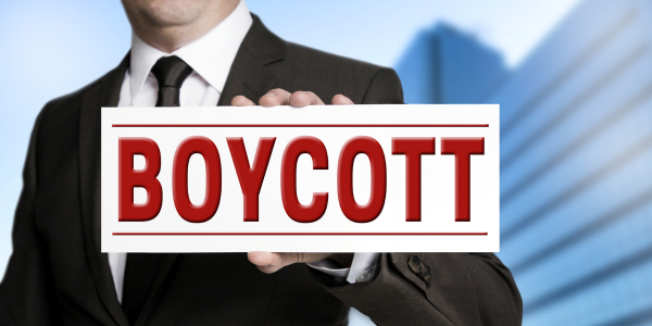 boycott man holding boycott sign