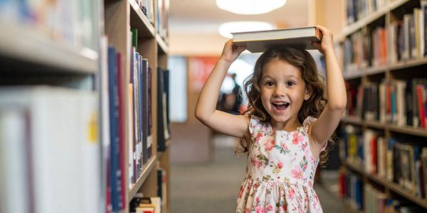 girl in school library