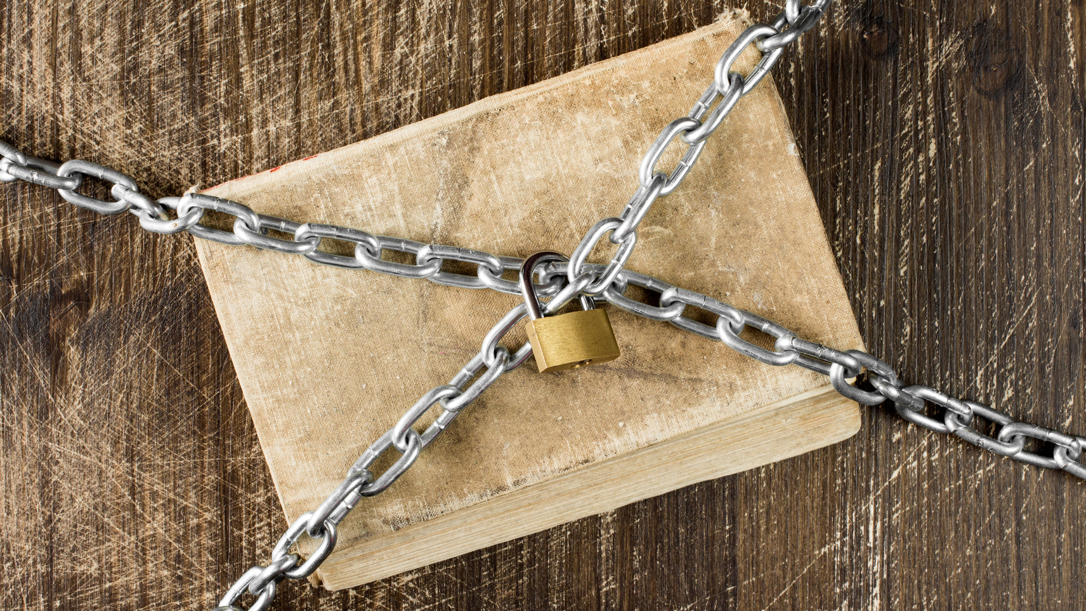 book with chains and a lock
