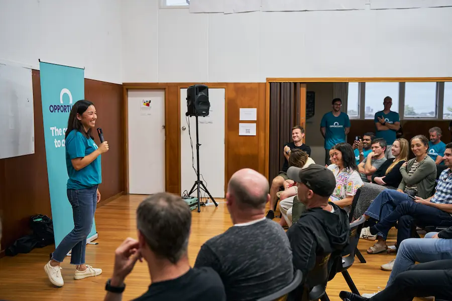 Qiulae Wong, speaking at Northcote War Memorial Hall