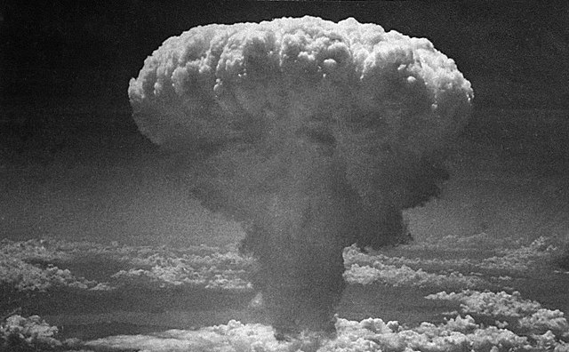 photo showing mushroom cloud over Hiroshima