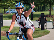 Photo - Woman having on bike