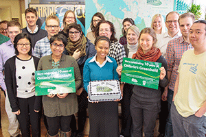 Photo - Greenbelt Staff with Greenbelt cake