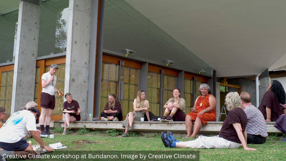 Creative Climate workshop attendees sitting outside.