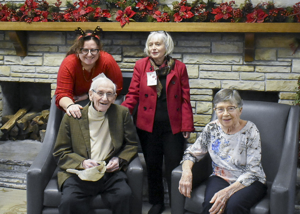 In this photo, you see myself with two other original founding members and our Executive Director. Alvin and Dorothy Goldman, seated, on the left, has been a part of our community for over 45 years.