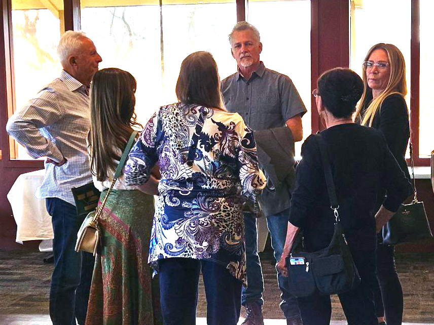 Lewis Herms speaks with supporters