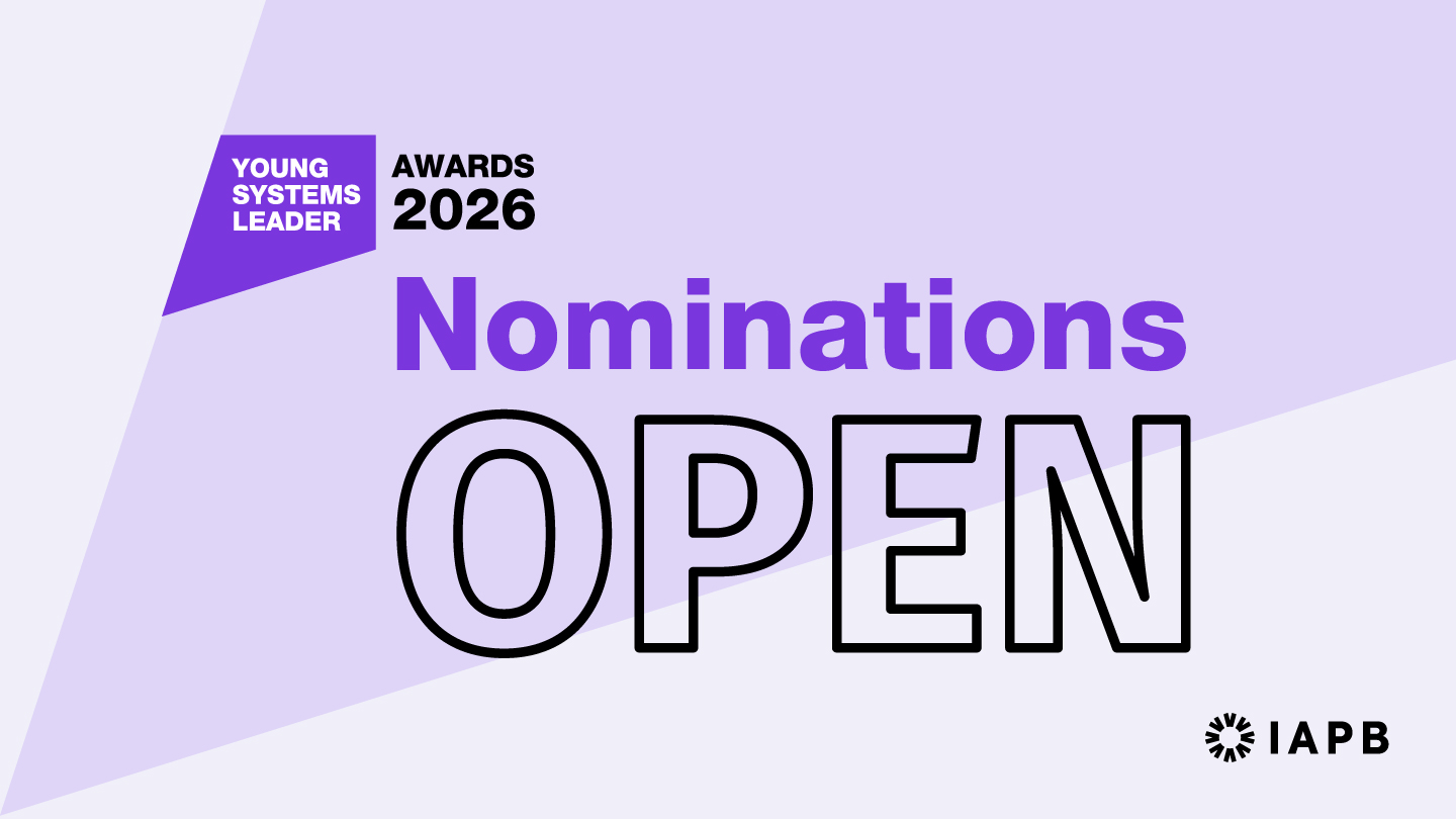 Purple-red, background in white text it
reads,"Nominations open" The IAPB is in the bottom right corner. 