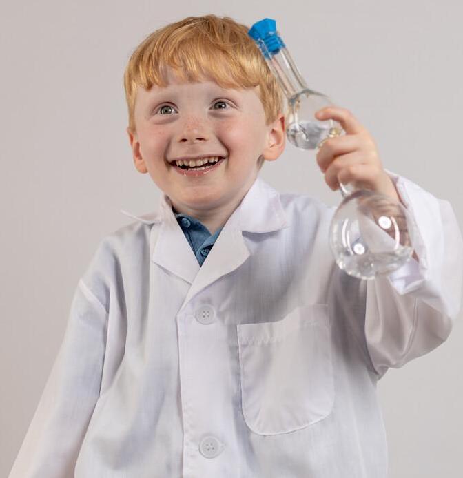 Ethan in lab coat