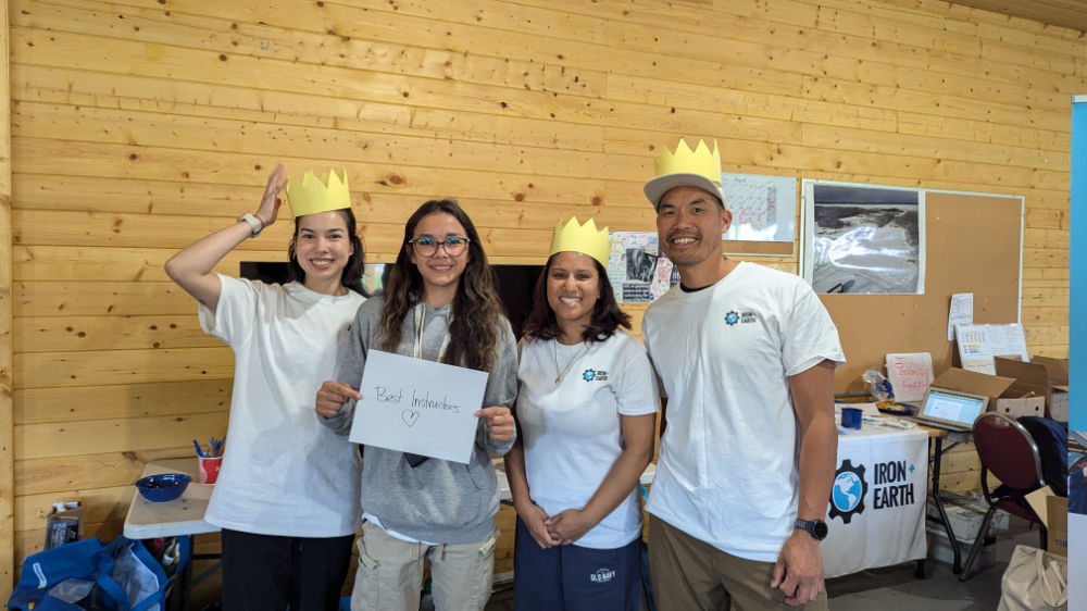 Iron & Earth Instructor and team members with an I&E trainee in Lubicon, AB, 2024 - from left to right: Jodie Hon, I&E Innovation and STEM Manager, I&E Trainee, MaryGold Bhandari, I&E Ops & Admin Coordinator, Kuan Jian Foo, I&E Instructor, Renewable Energy Consultant and Registered Energy Advisor