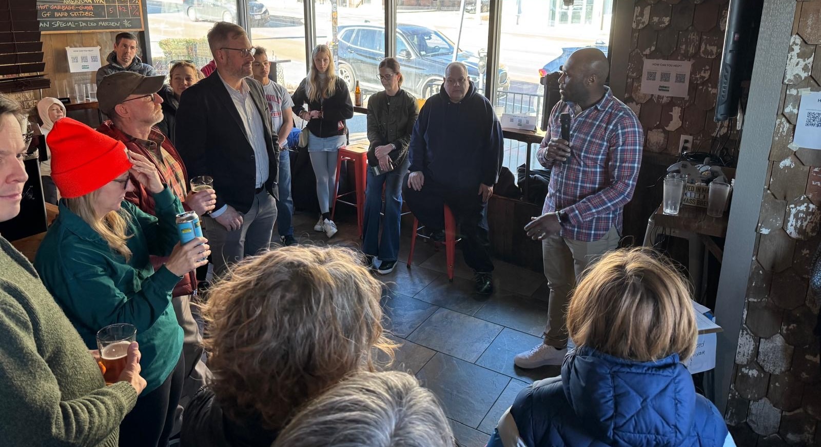 Jake WHBC Jake and a crowd stand at Winter Hill Brewing Co