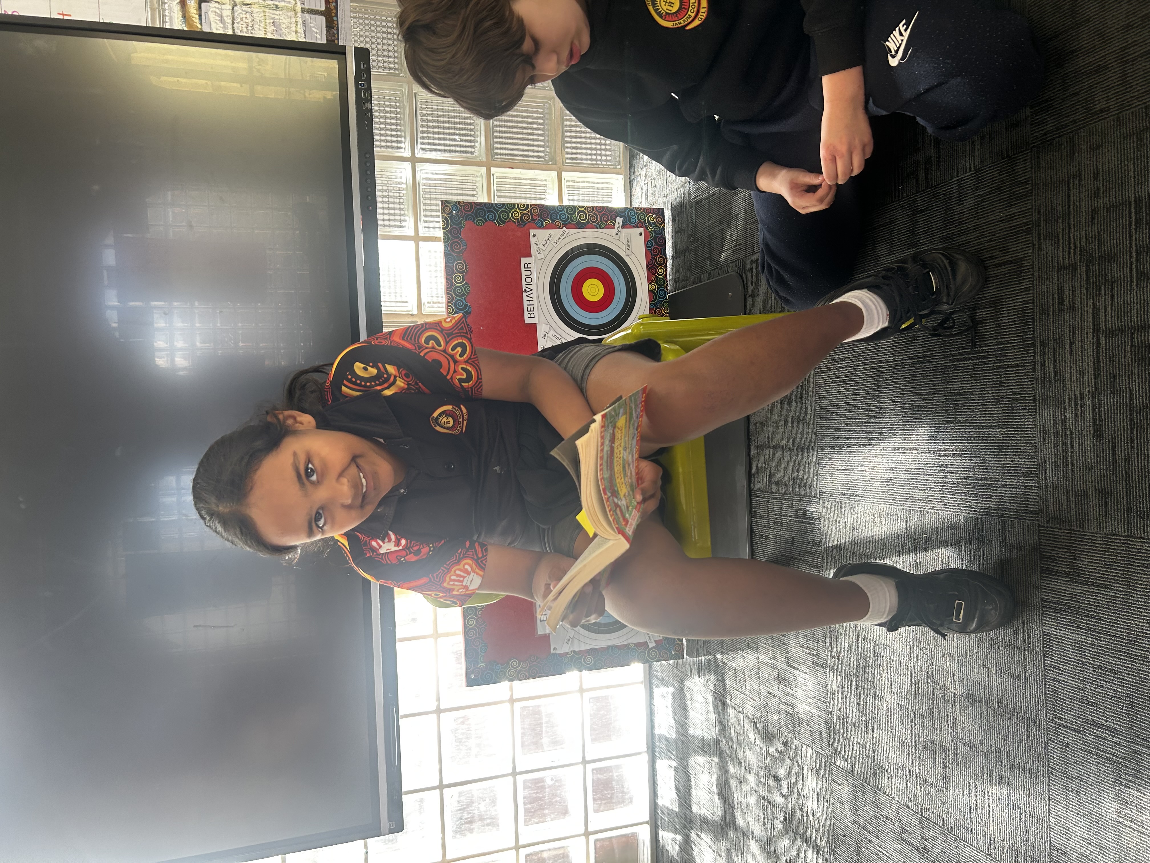 A Jarjum student reading aloud to classmates